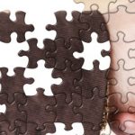 handshake puzzle closeup