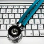 stethoscope on laptop