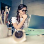 adult woman at a computer